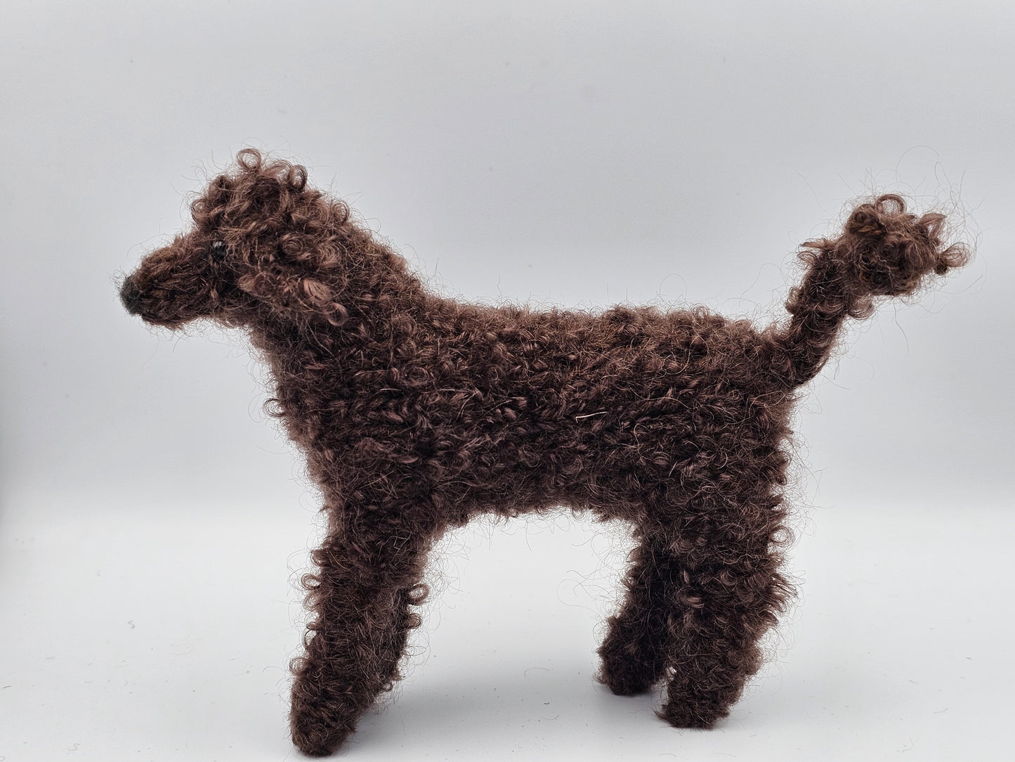 Knitted dark brown Standard Poodle in mohair