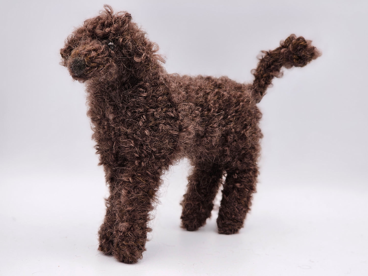 Knitted dark brown Standard Poodle in mohair