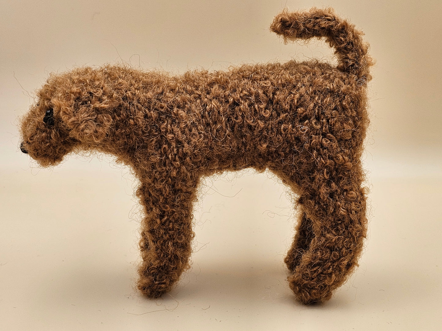 Fluffy handknitted fox red golden Labradoodle with movable head, legs and tail.