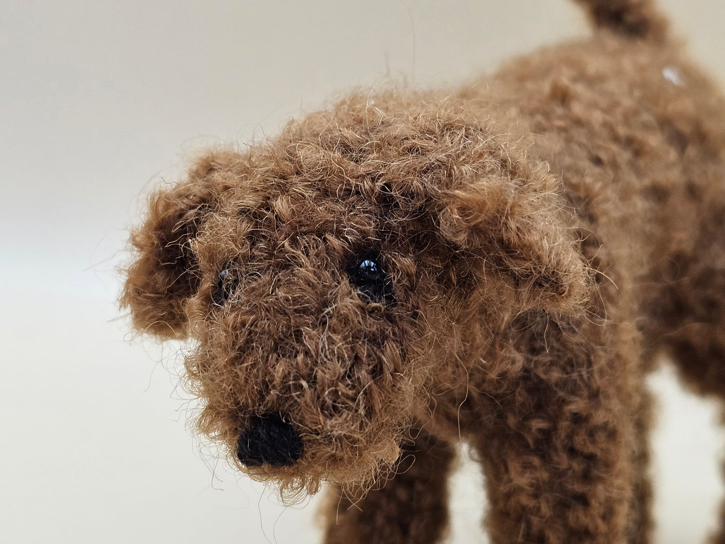 Fluffy handknitted fox red golden Labradoodle with movable head, legs and tail.