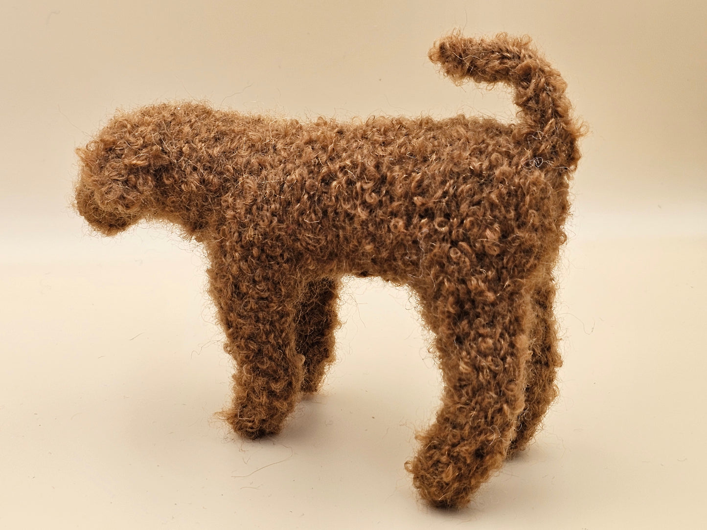 Fluffy handknitted fox red golden Labradoodle with movable head, legs and tail.