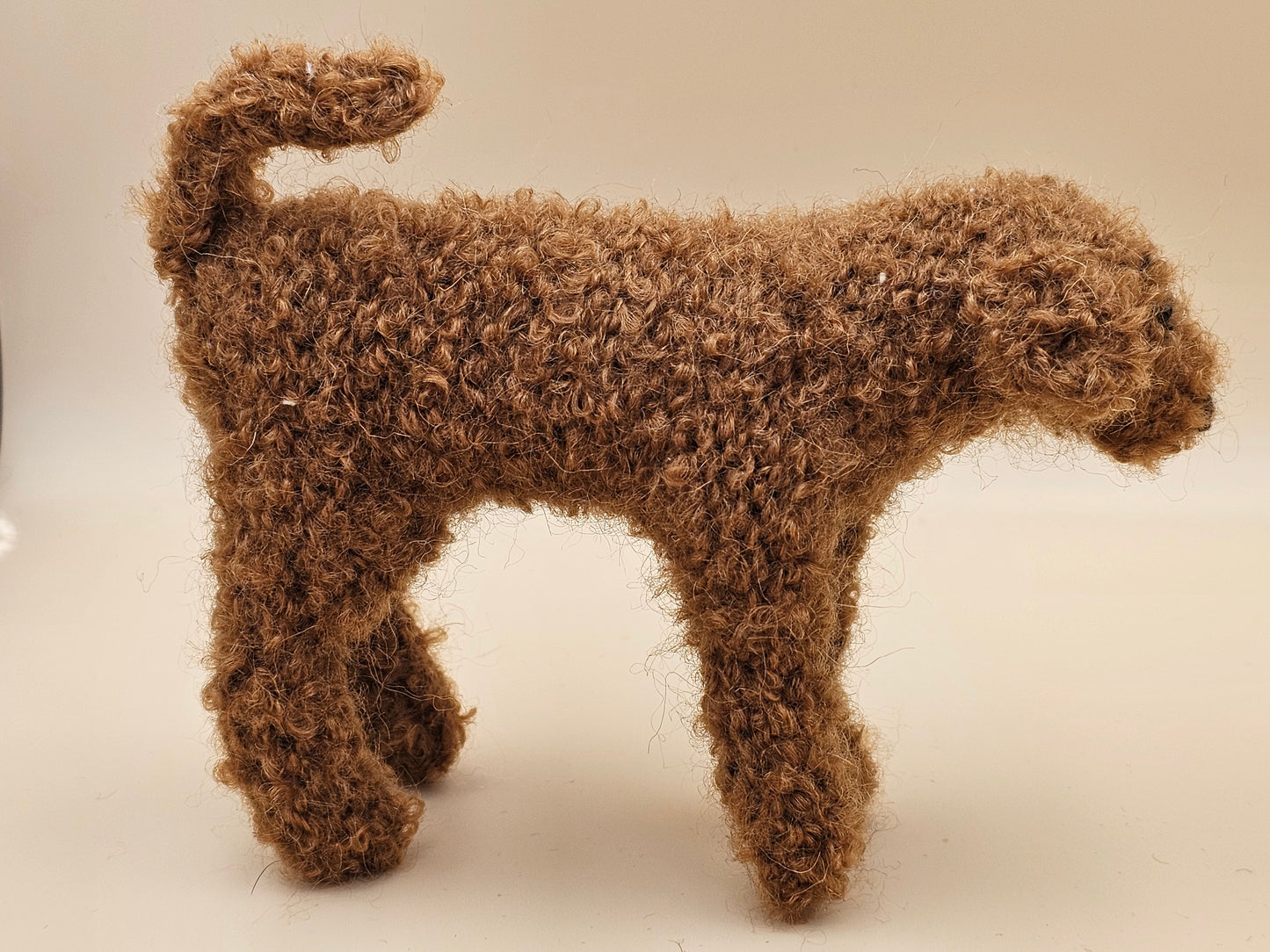 Fluffy handknitted fox red golden Labradoodle with movable head, legs and tail.