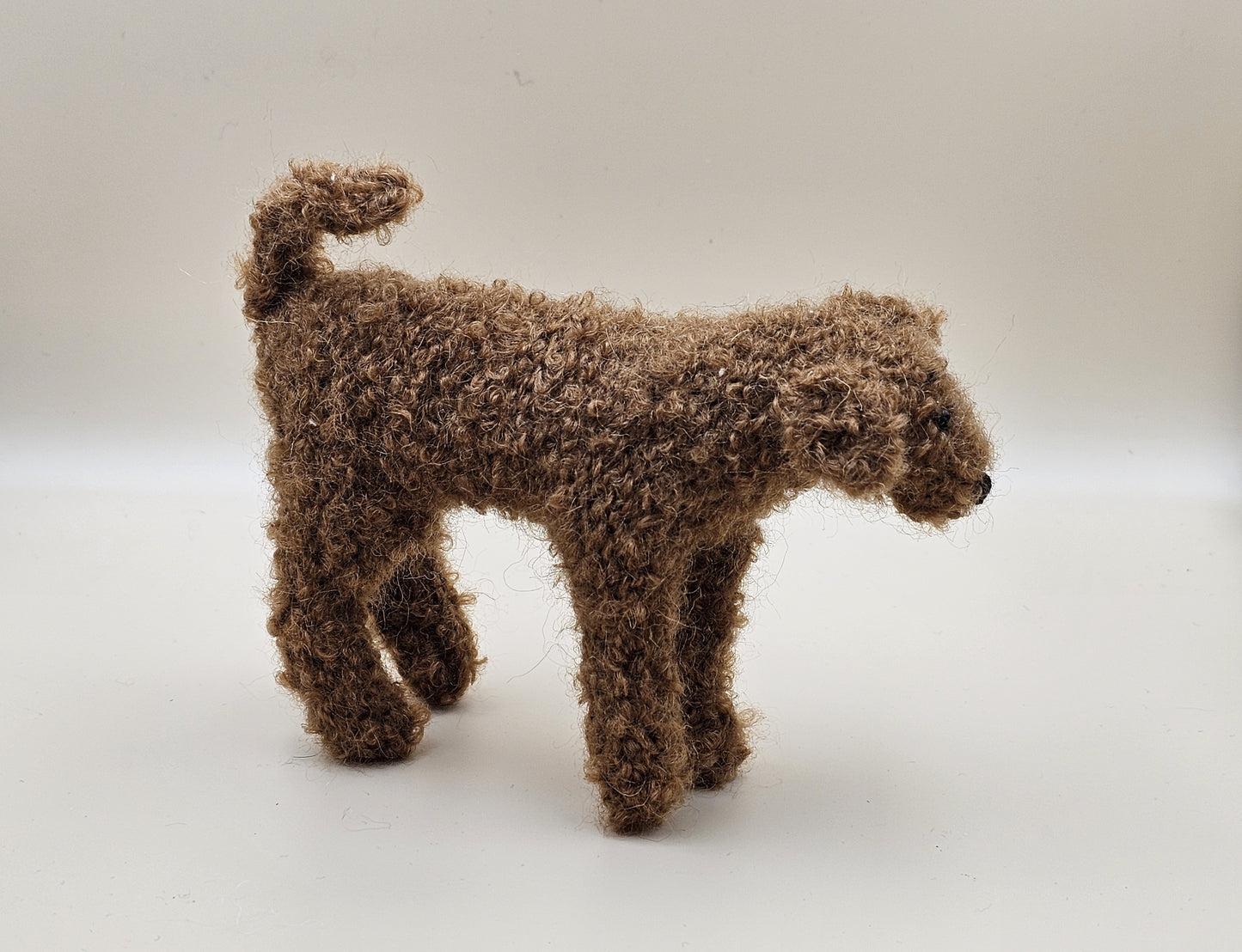 Fluffy handknitted fox red golden Labradoodle with movable head, legs and tail.